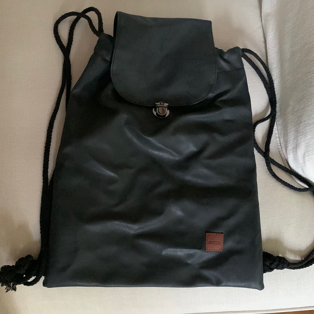 Spanish backpack bought in new like new a free item w/ purchase
